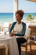 Halcyon Collection Women’s Rashguard – Sand & Navy